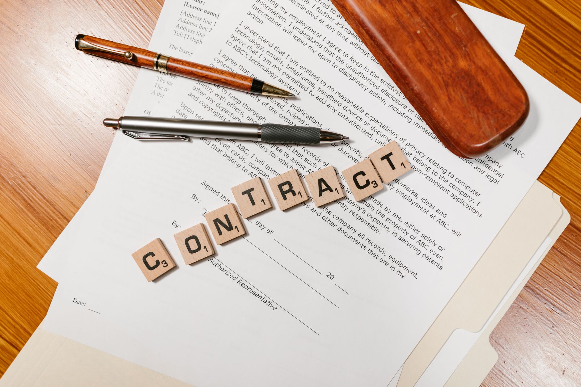 Vendor contract files on desk